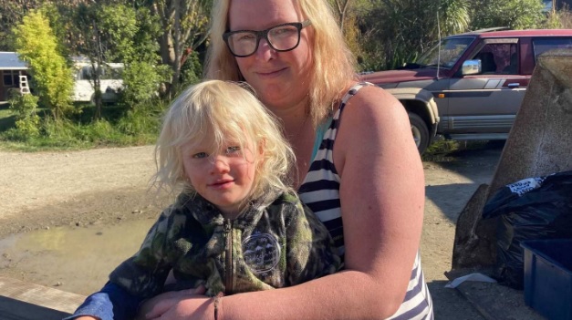 Axle Hamblyn with his mum Haley Allatt. Photo: NZ Herald