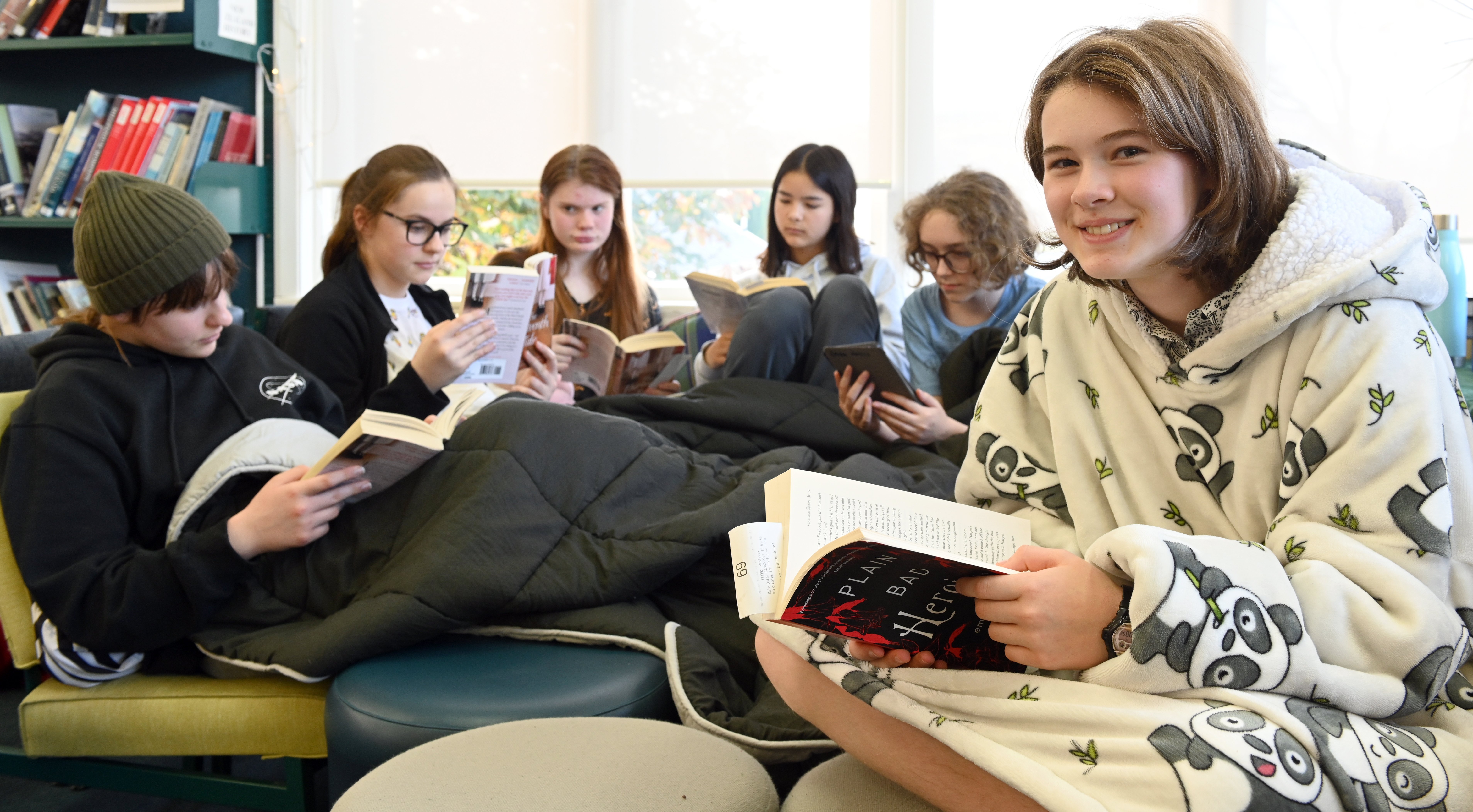 Taking part in a reading marathon at Columba College Library on Saturday are (from left) twins...