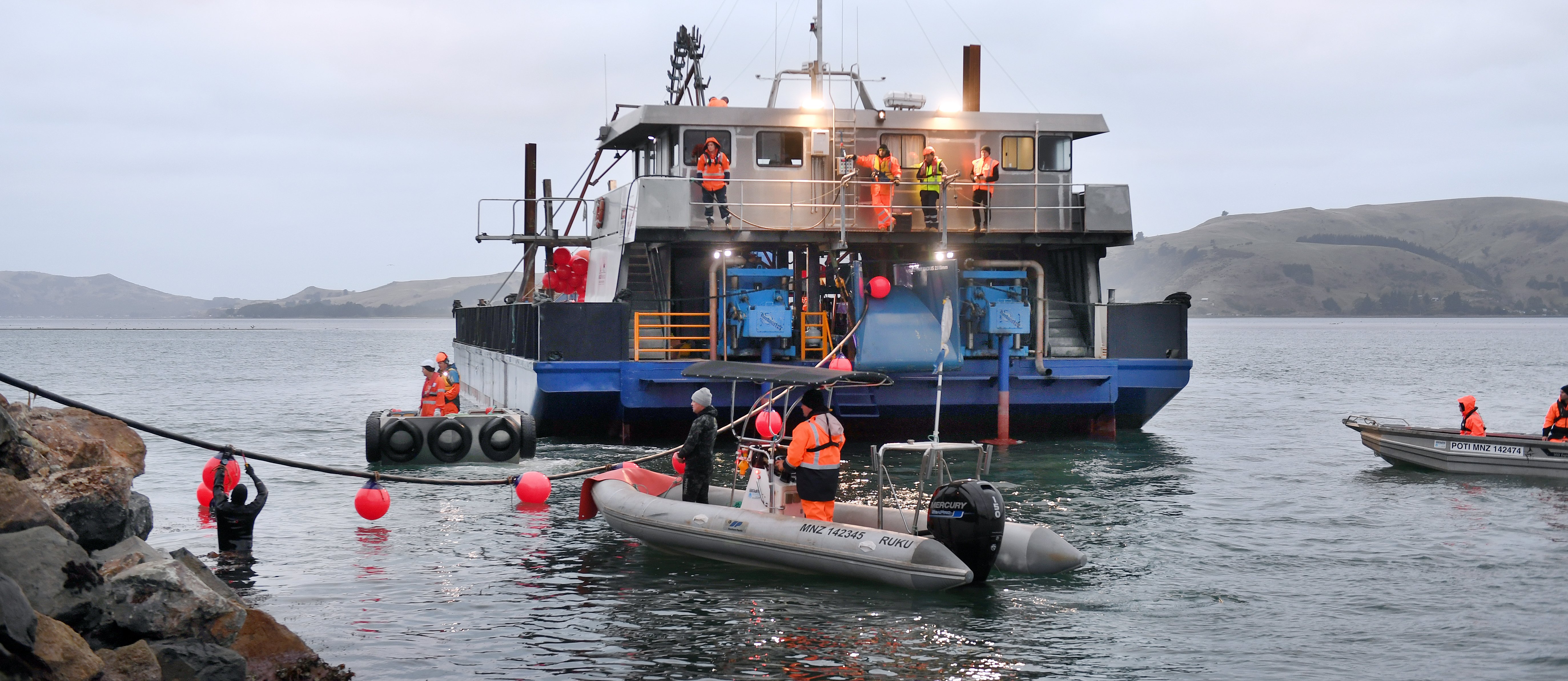 Cable-laying barge Patiki lays a new underwater power cable between Port Chalmers and Portobello...