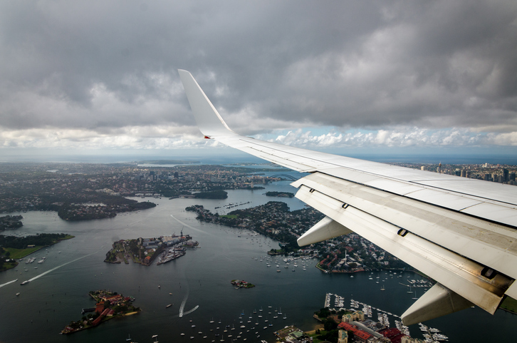 A plane flies over Sydney as it comes in to land. Photo: Getty