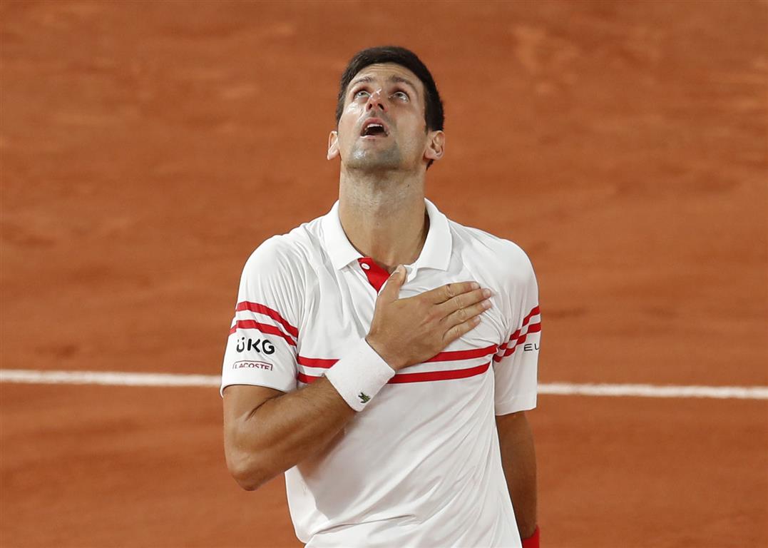 Novak Djokovic celebrates winning his semifinal match against Rafael Nadal. Photo: Reuters