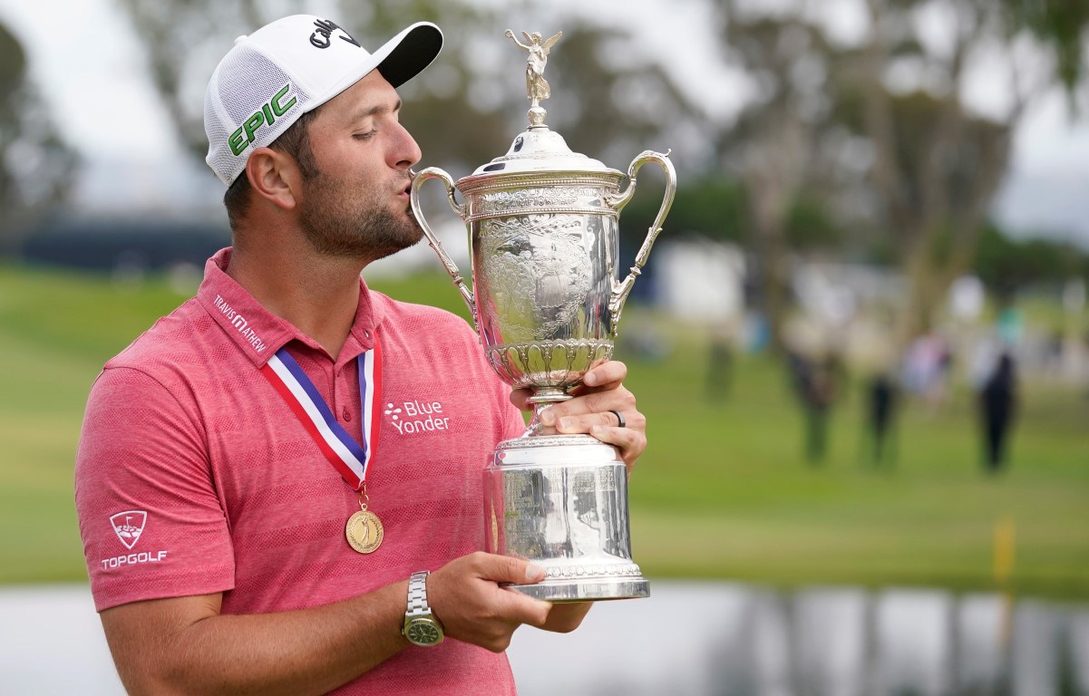 Jon Rahm kisses the trophy after winning the US Open at Torrey Pines Golf Course. Photo: Michael...