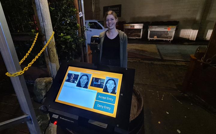 Whangārei bar The Butter Factory employee Breanna Marris demonstrates how the Patronscan system...