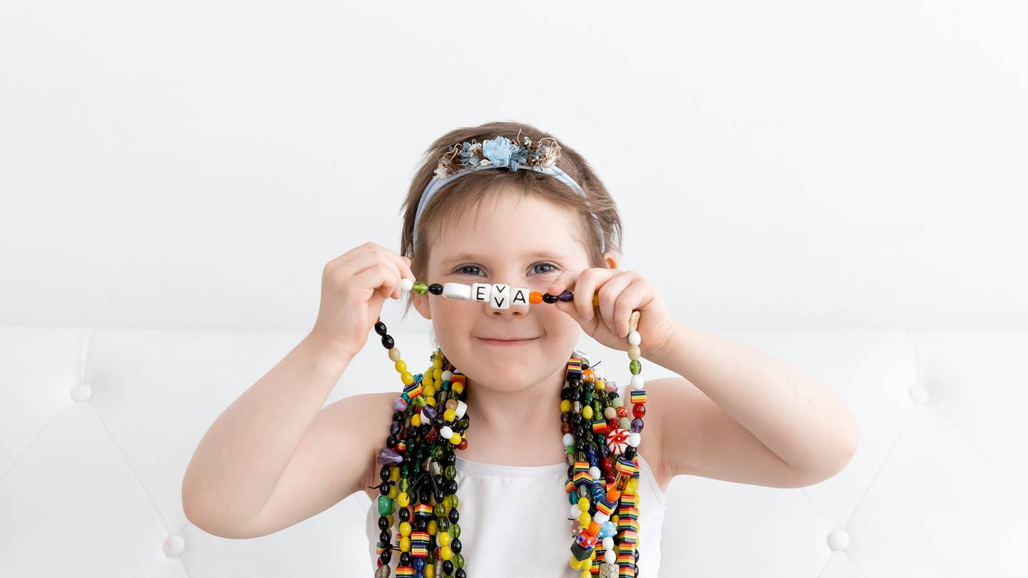 Eva Sallabanks with the beads of courage she collected during treatment the first time she was...