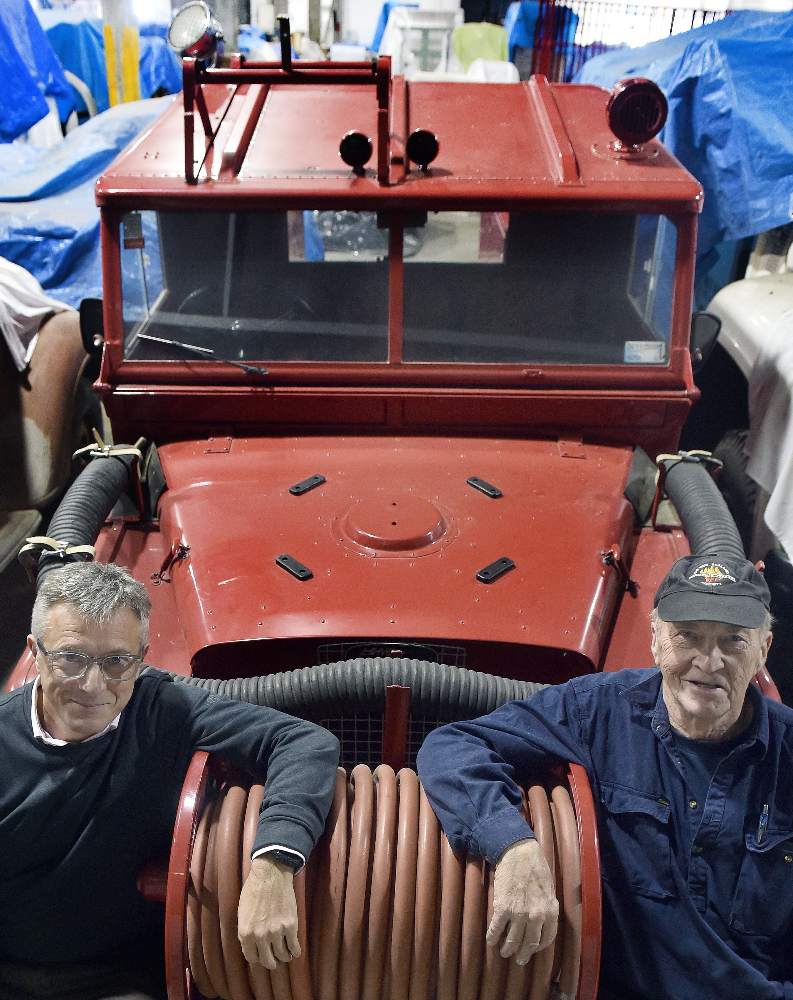 Aurora Energy Ltd chief executive Richard Fletcher (left) and Dunedin Fire Brigade Restoration...