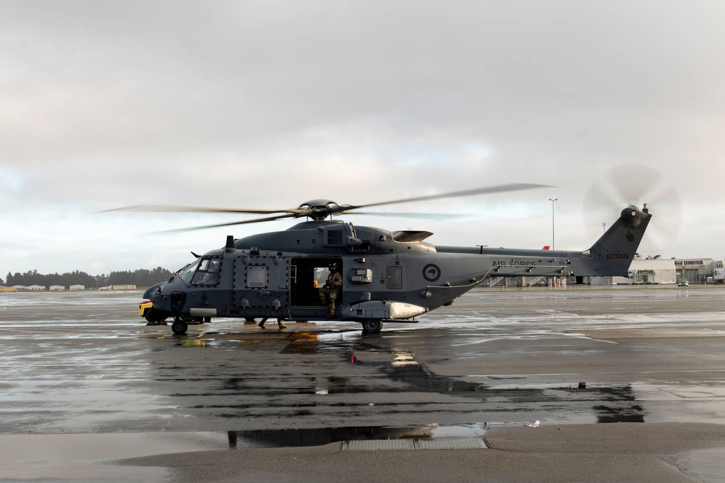 An RNZAF NH90 helicopter was used to rescue three people stuck in flood waters on Sunday. Photo:...