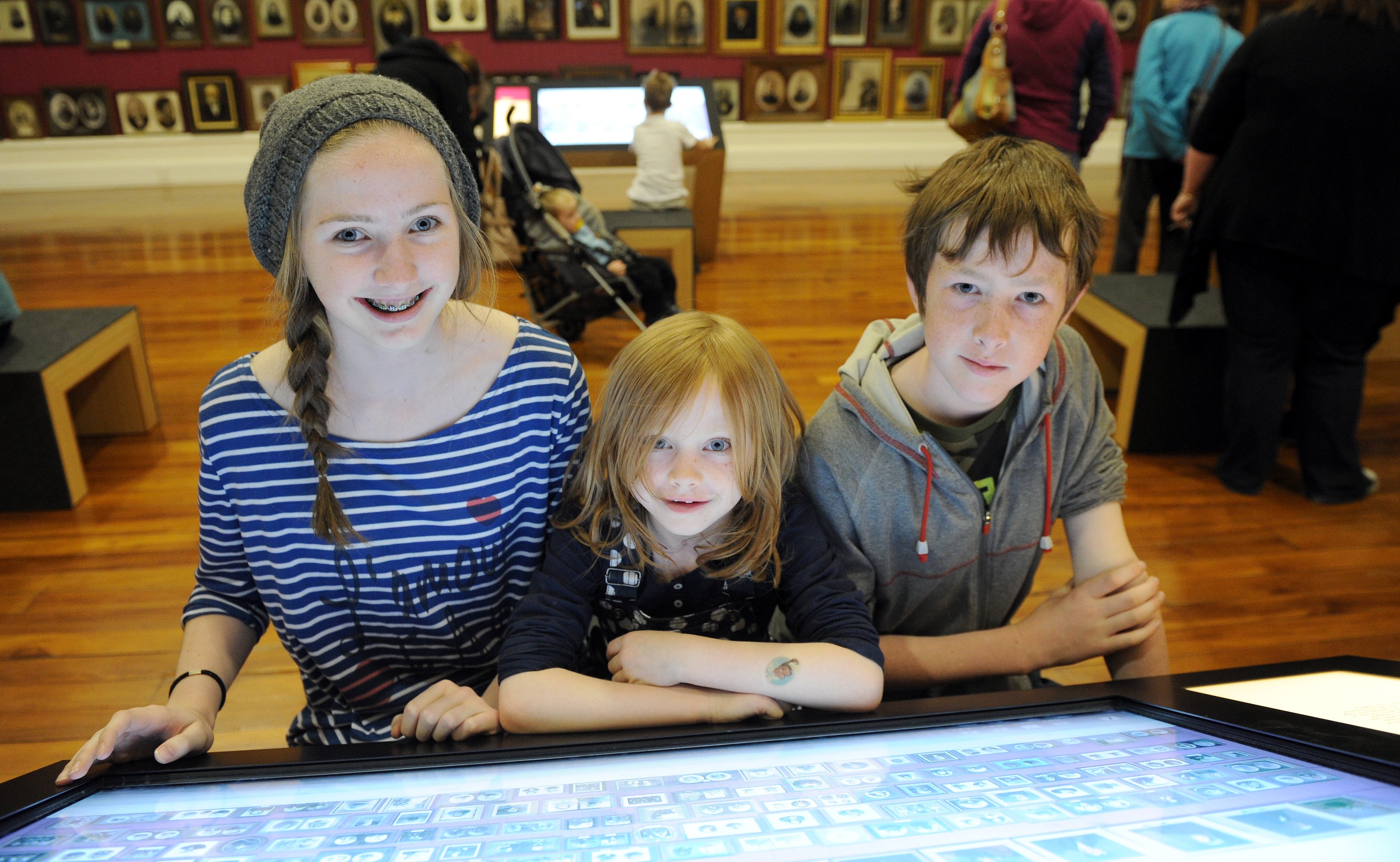 Children are entertained by a display at the reopening of Toitu Otago Settlers  Museum in 2012.