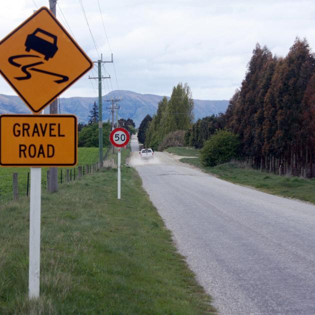 A sign warns of changes in the surface of Ballantyne Rd. Photo: Tim Miller (file)