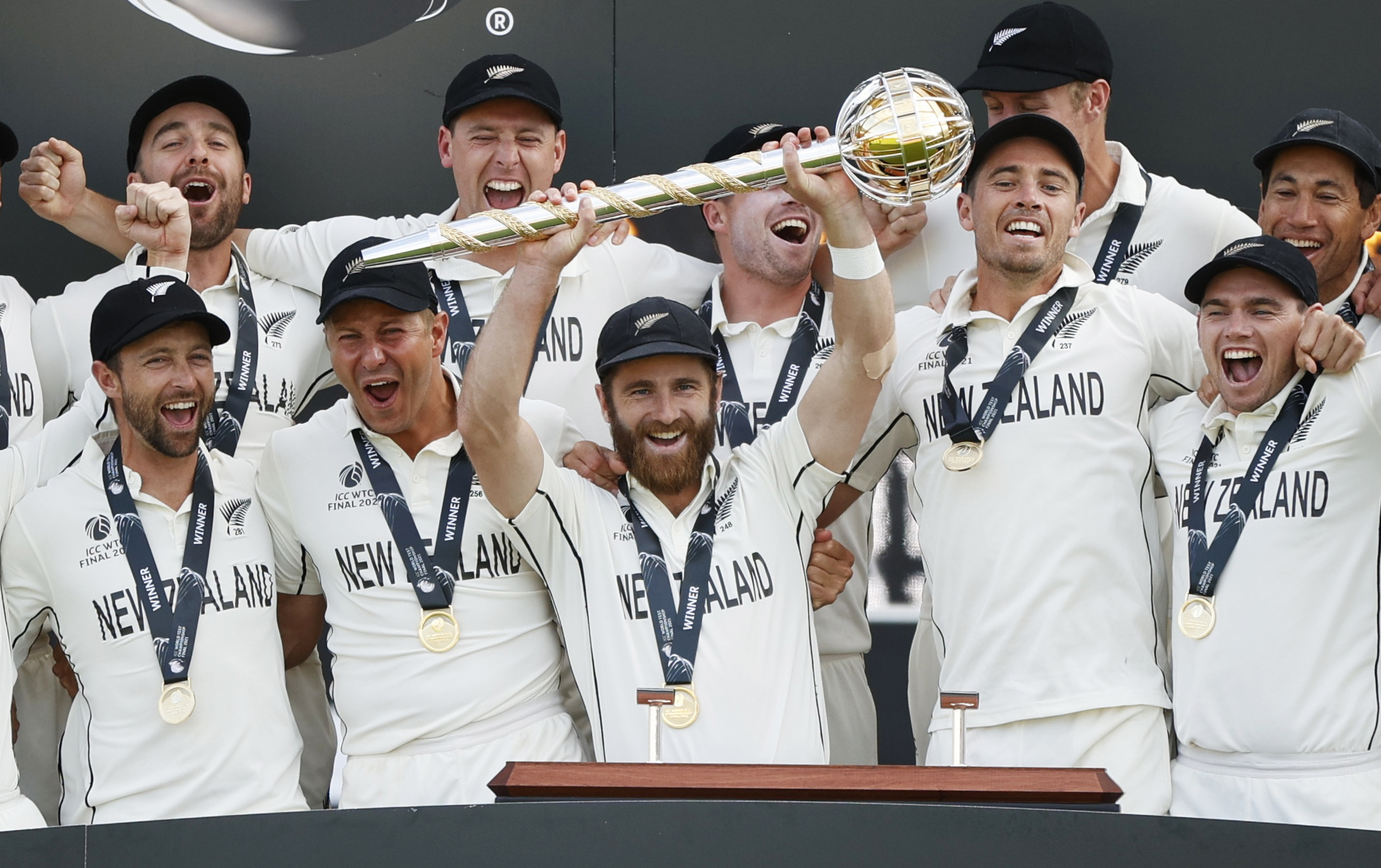 Captain Kane Williamson holds the Mace as the Black Caps celebrate becoming World Test Champions....