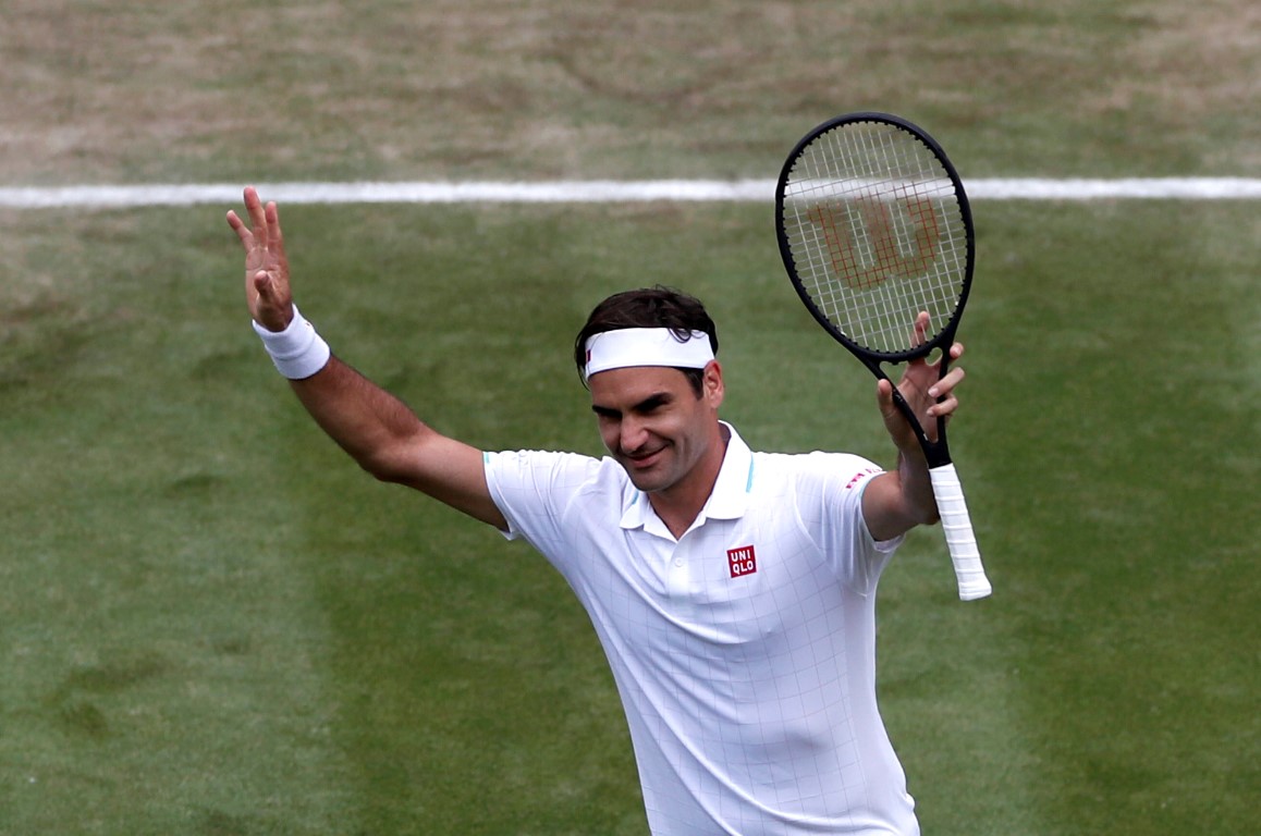 Roger Federer celebrates winning his third-round match against Britain's Cameron Norrie. Photo:...