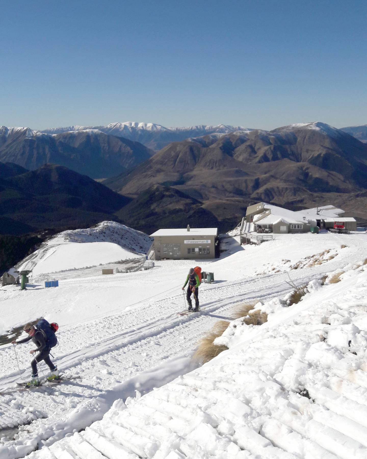 Tour skiers walk up to the snowline in the Cheeseman Ski Area. Photo: Thomas Bywater