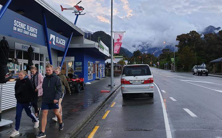The absence of tourists has caused the permanent population of Franz Josef to drop - meaning...