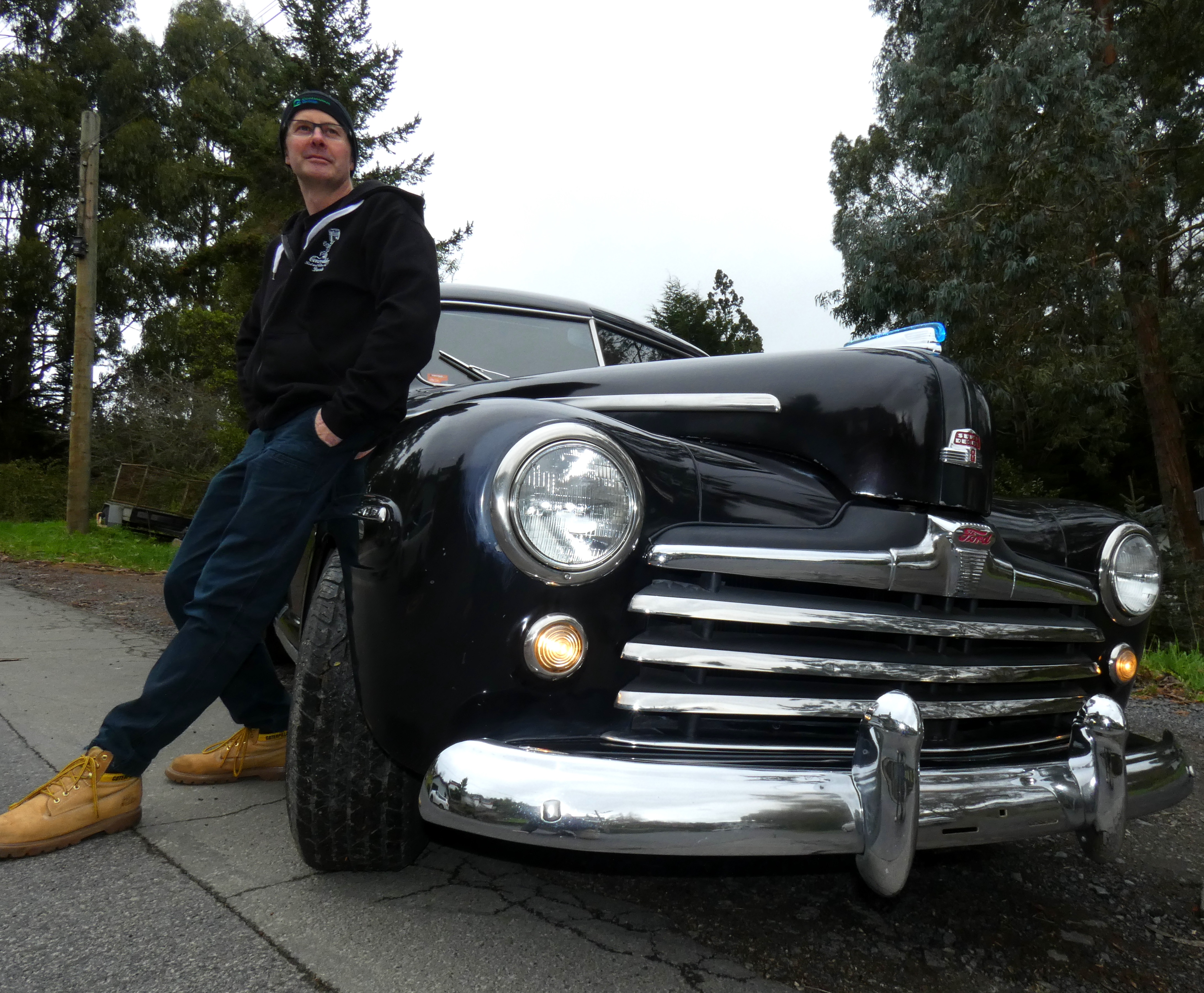 Dark secret revealed . . . Reuben Kinghorn, of Concord, says his 1947 Ford Club Coupe Super...
