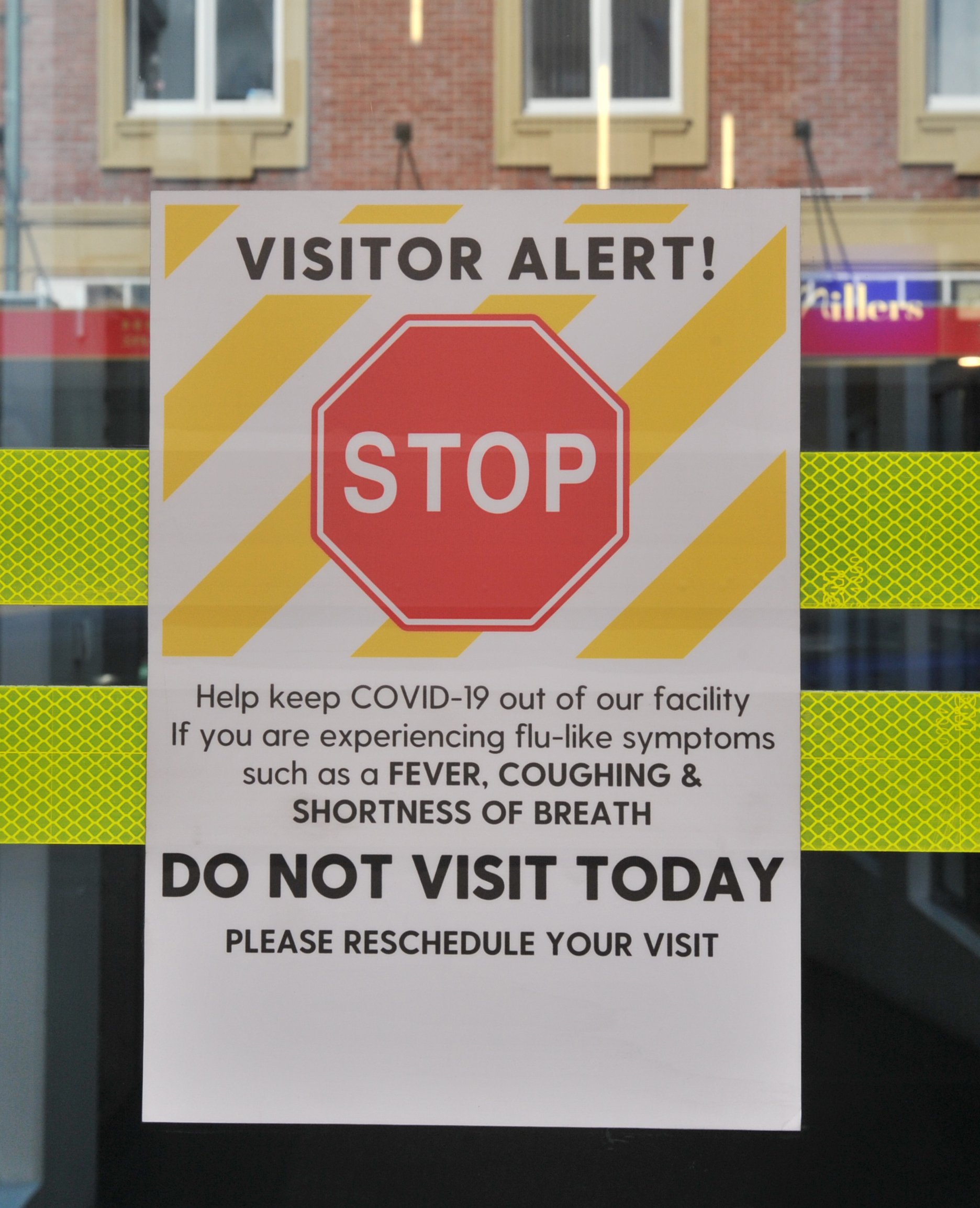 A Covid-19 caution sign has gone up in the Wall Street Mall in Dunedin. PHOTO: CHRISTINE O’CONNOR