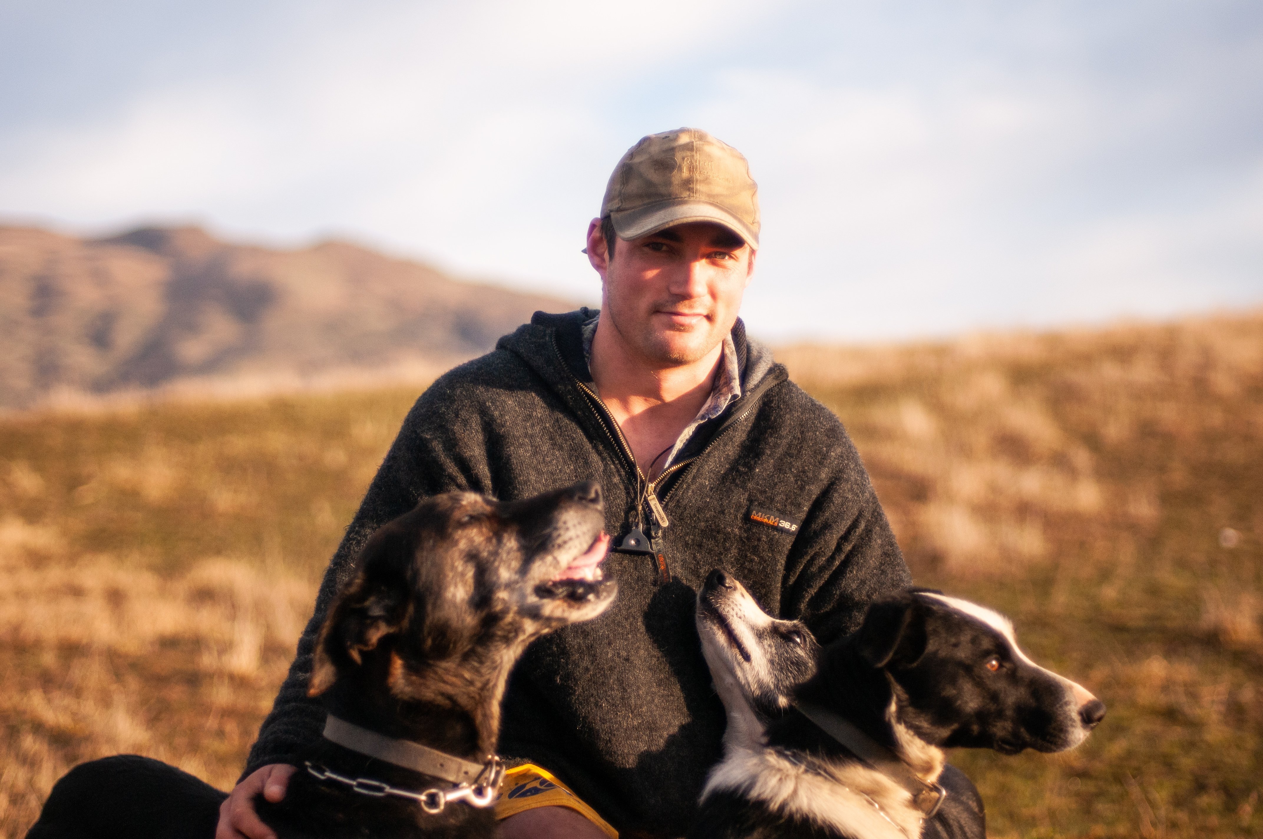 Ben Maxwell with some of his dogs. Mr Maxwell has traded Invercargill for farming in the Lindis...