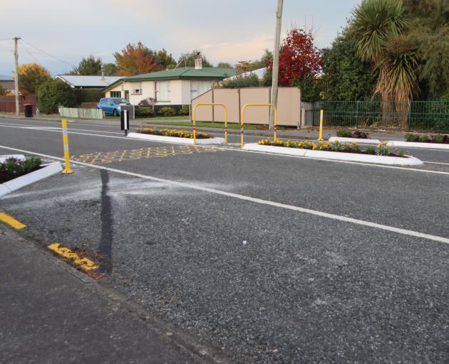 A courtesy crossing in Broughton St has been transformed with a refuge island and bulbous kerbs....