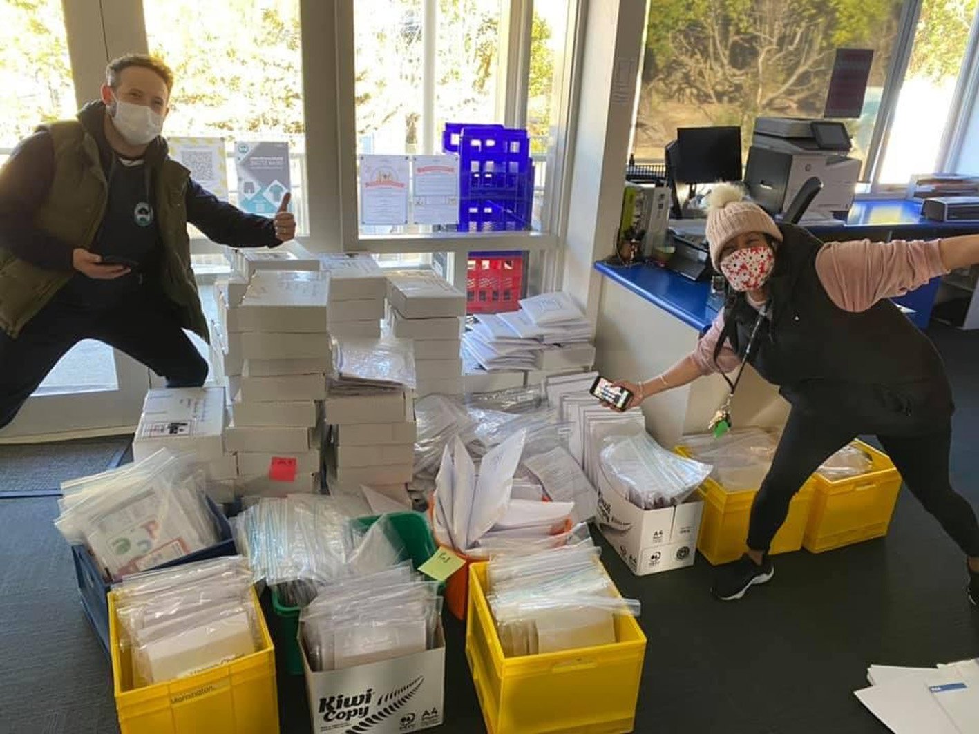 Preparing home learning packs and devices for pupils are Zac Ford and Diana Guthrie, of Balaclava...