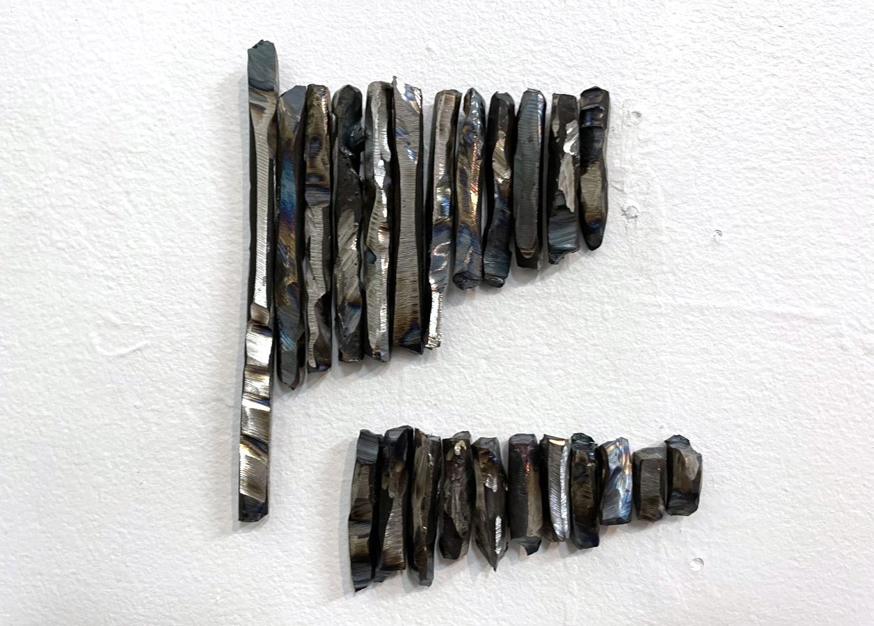 The metal in Sonya Lacey’s ‘‘Totally Dark [Chlorophyll]’’, is on display at Favour Gallery,
