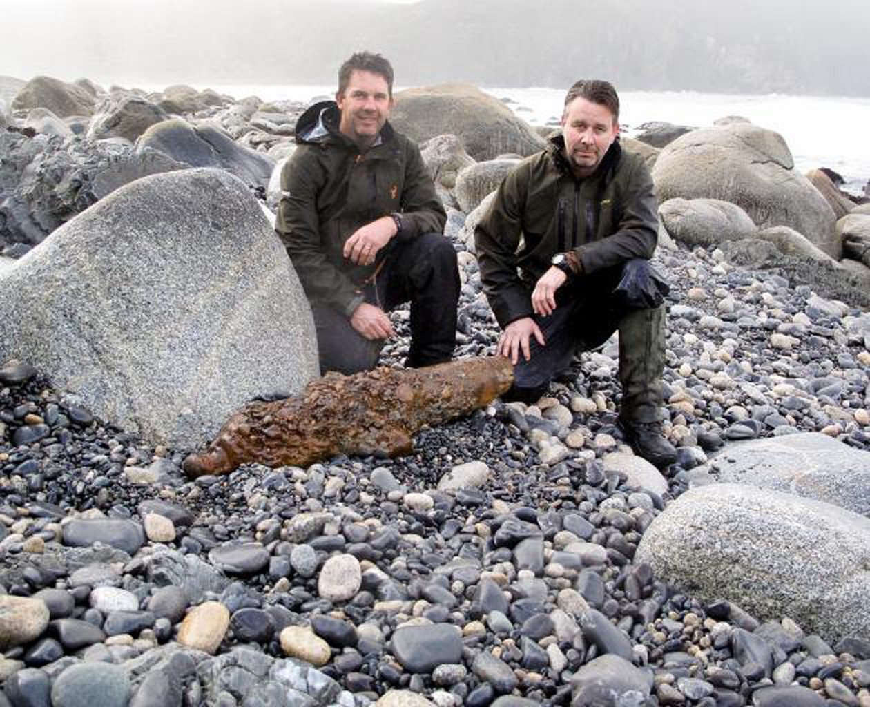 Willowbank Wildlife Reserve staff Dale Hedgcock (left) and Michael Willis with the cannon...