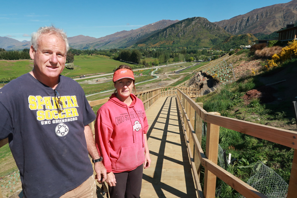 Derek and Anna Brown pictured on the controversial boardwalk outside their Arrowtown house in...