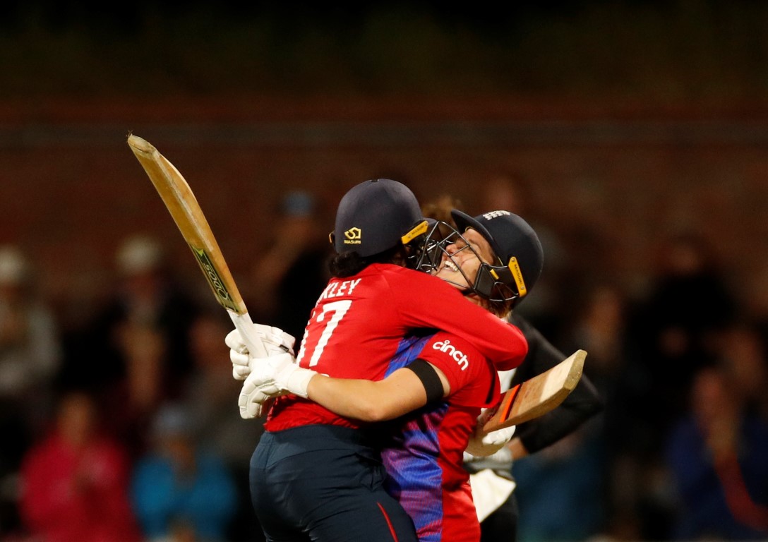 England's Sophia Dunkley and Katherine Brunt celebrate their victory. Photo: Reuters