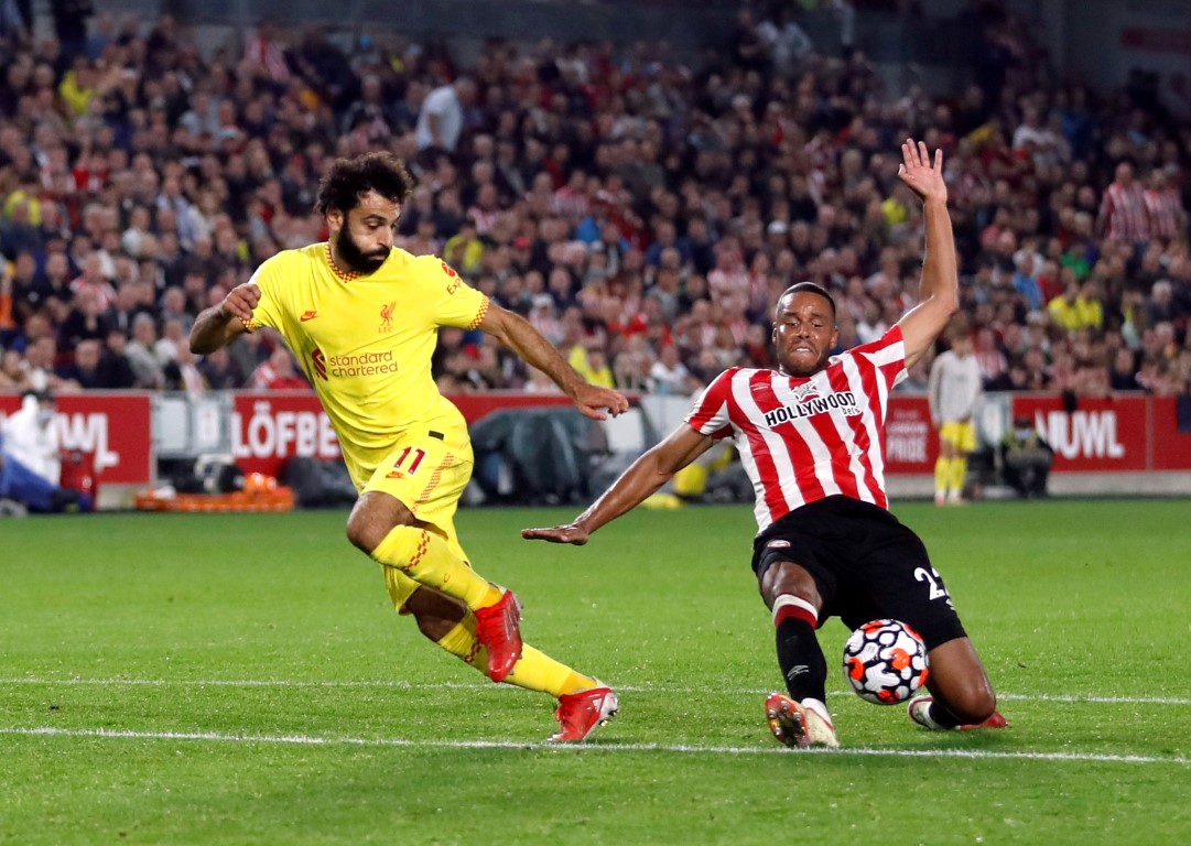 Liverpool's Mohamed Salah in action with Brentford's Mathias Jorgensen. Photo: Action Images via...