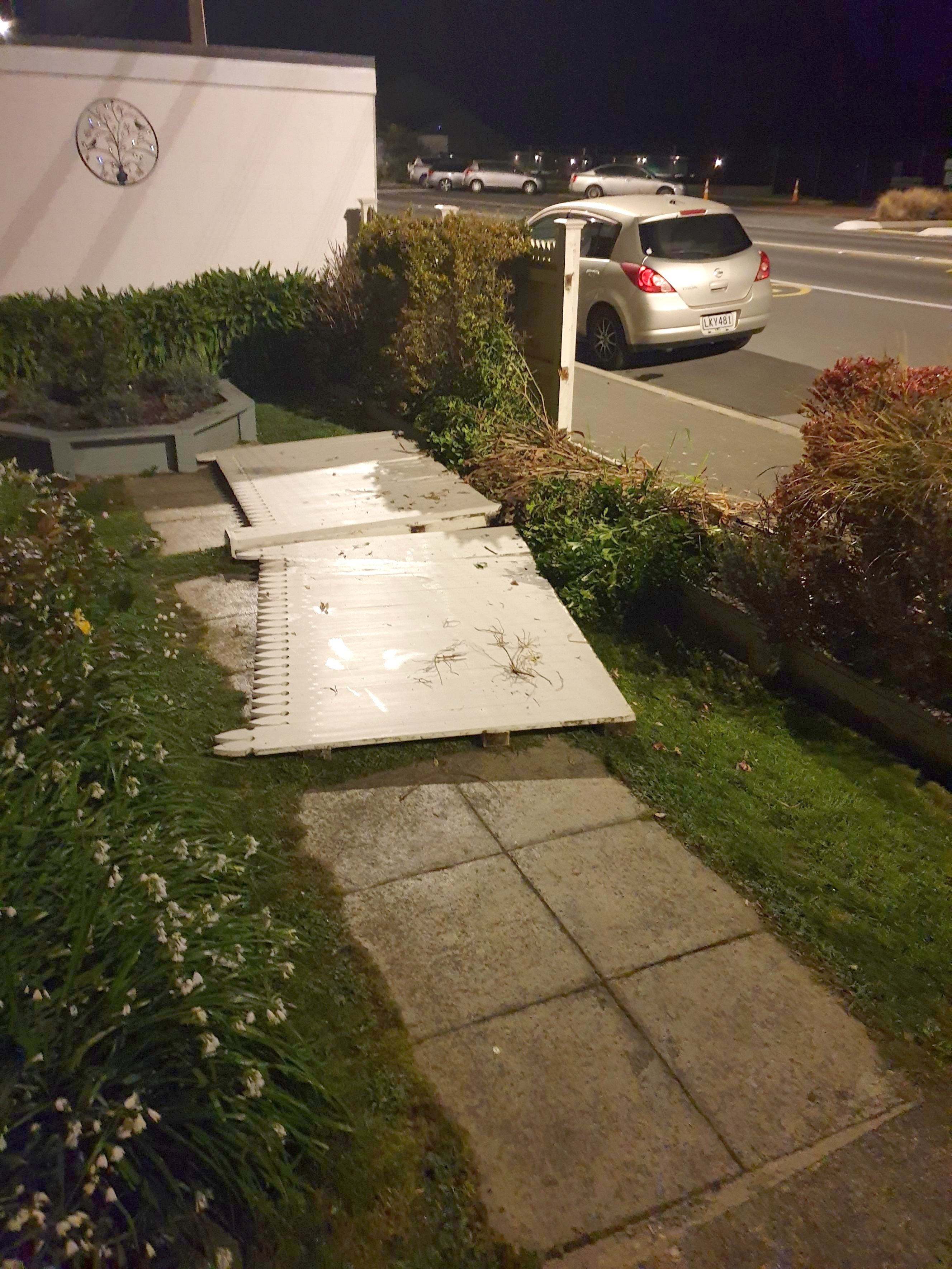  The early morning scene after a car ploughed into Lynette Harris’ fence. PHOTO: LYNETTE HARRIS
