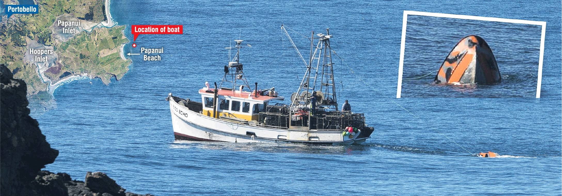 Commercial fishing boat Echo tows the submerged recreational boat back to Carey’s Bay after it sank near Papanui Beach, on Otago Peninsula. Inset: The bow of the sinking boat points skyward off the Dunedin coastline yesterday. Two minutes later, it was fu