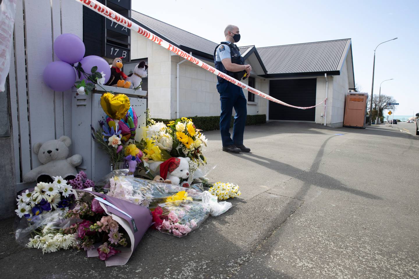 The public have begun leaving flowers and teddies outside a Queen St, Timaru house where the...