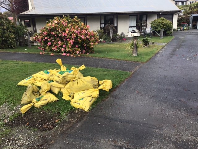 Queenstown Lakes District Council-supplied sandbags outside Val McMillan’s Arrowtown home to help...