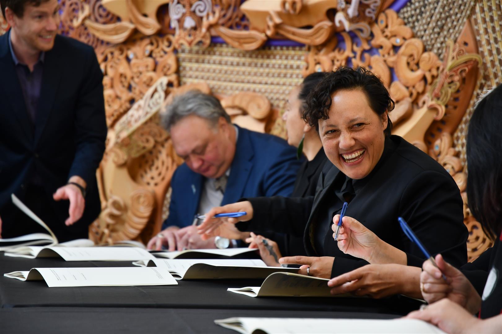 Conservation minister Kiritapu Allan signs the agreement in Bluff today. Photo: Laura Smith

