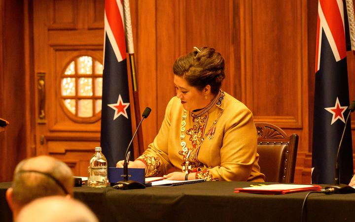 Dame Cindy Kiro signs the oaths at Parliament. Photo: 2021 Mark Tantrum