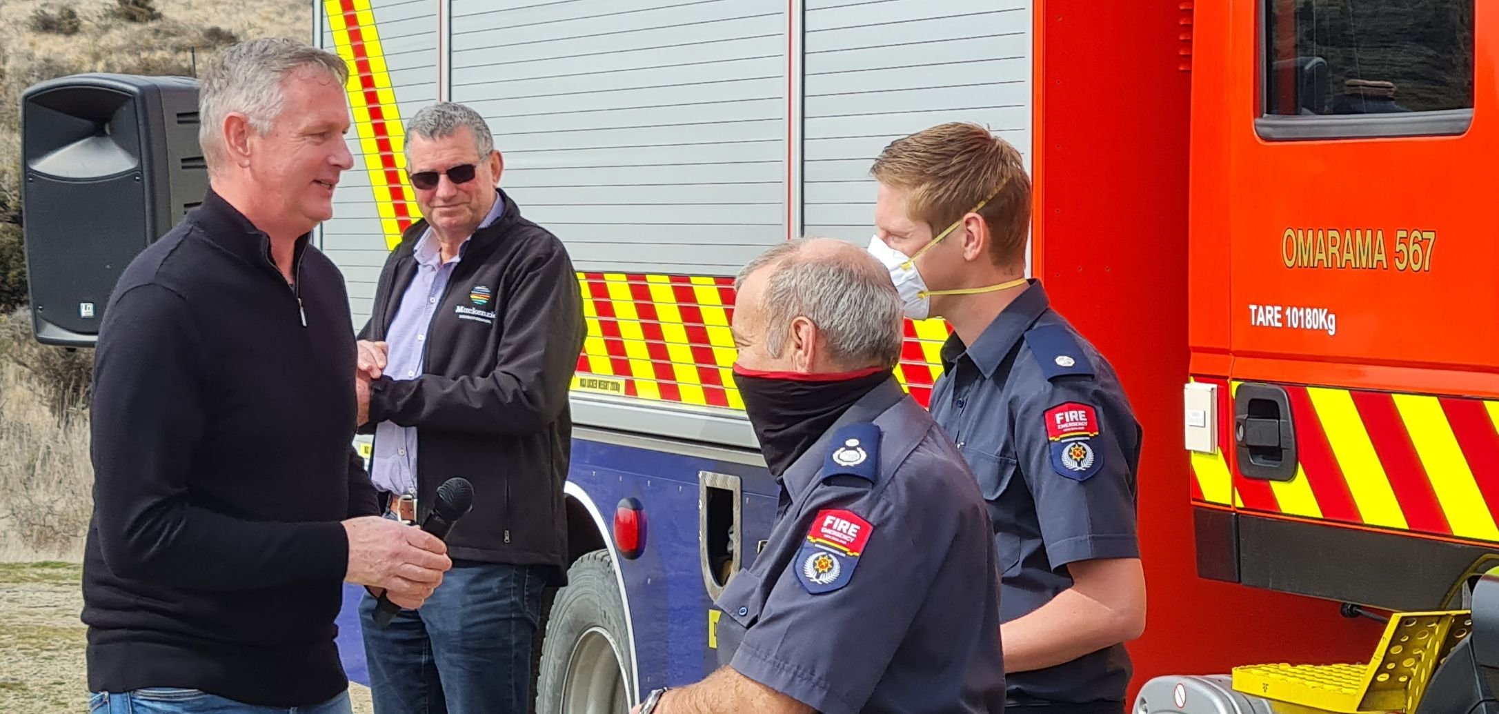 Grateful for the work of firefighters, Waitaki Mayor Gary Kircher (left) and Mackenzie Mayor...