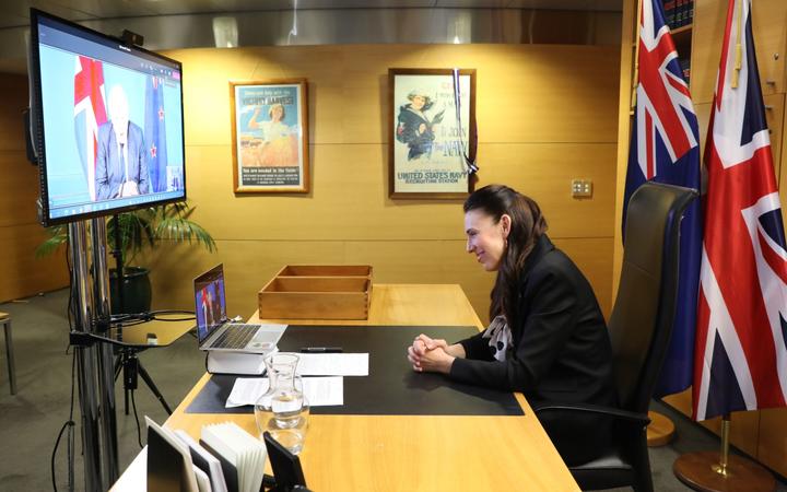 Prime Minister Jacinda Ardern and her British counterpart Boris Johnson speak via...