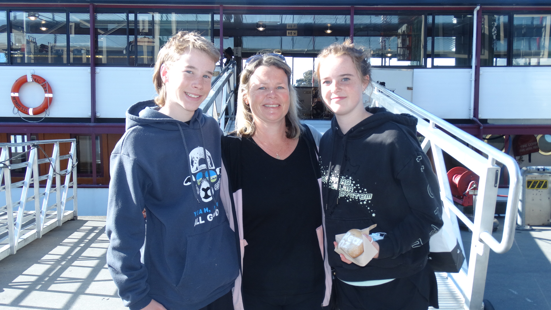 Hayden (12) and Jessica (13) Hodge, with their mother Melanie, received jabs on board TSS...