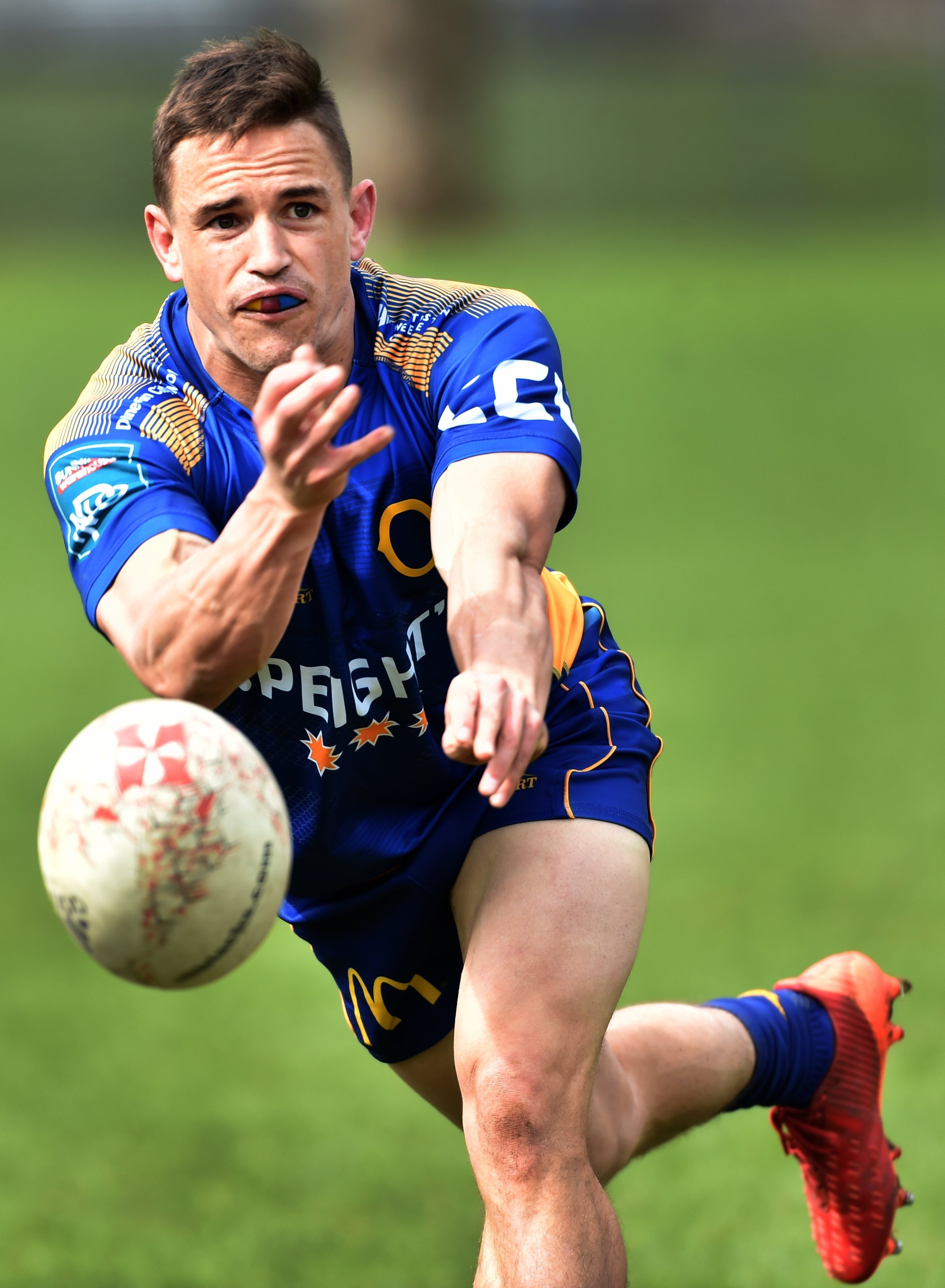 Otago halfback Kayne Hammington clears the ball from a ruck at training on Thursday. PHOTO: PETER...