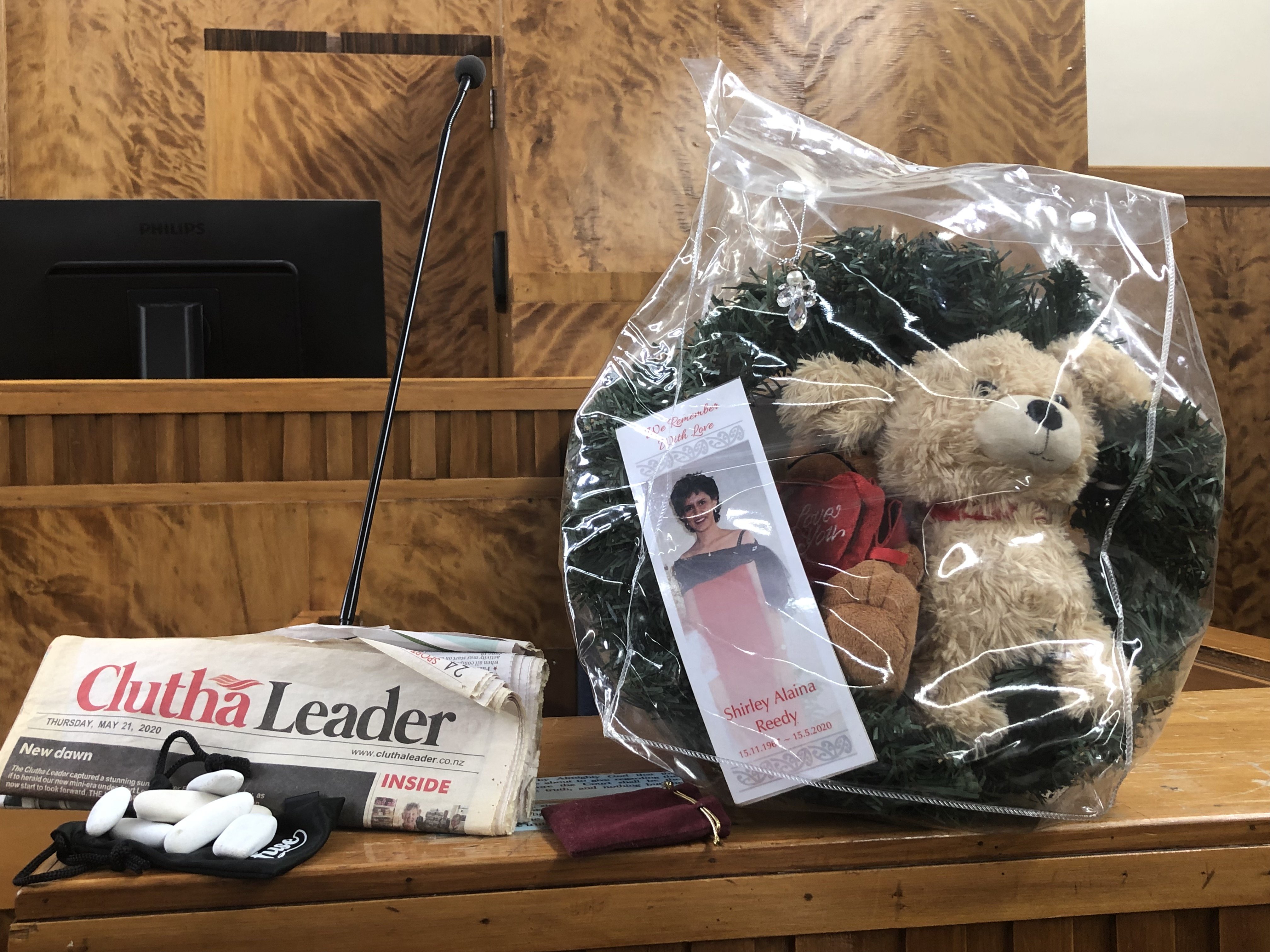 The family of Shirley Reed placed some of her treasured belongings in the court during the...