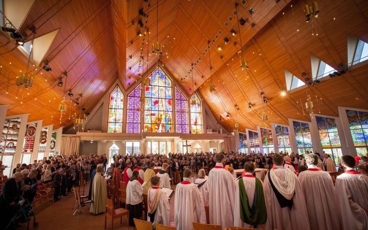 Ellis designed some of the windows, right, at Holy Trinity Cathedral in Parnell. Photo: Supplied