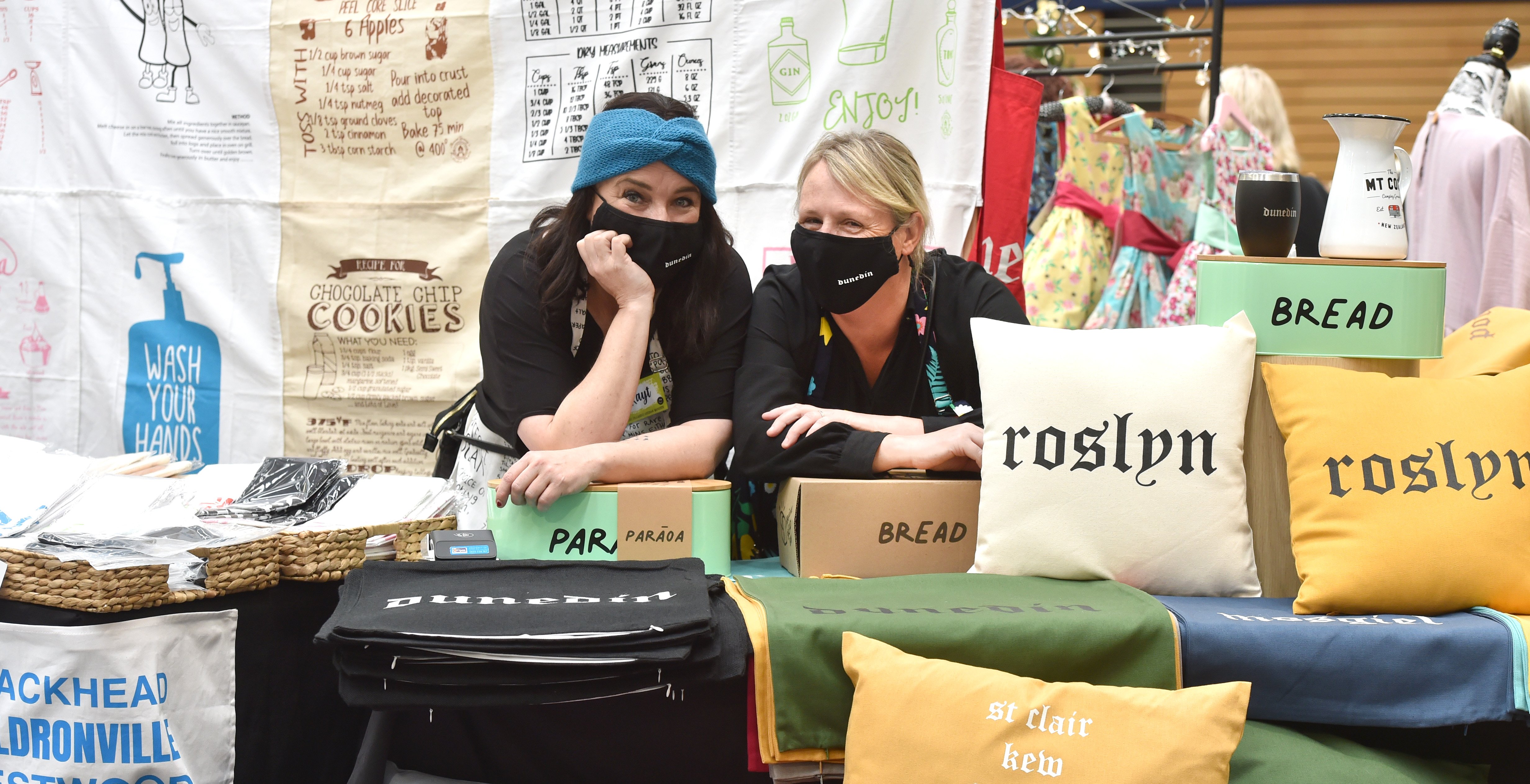 Stallholders Kayt Harris (left) and Sandy Jefferies display Dunedin-inspired wares at yesterday’s...