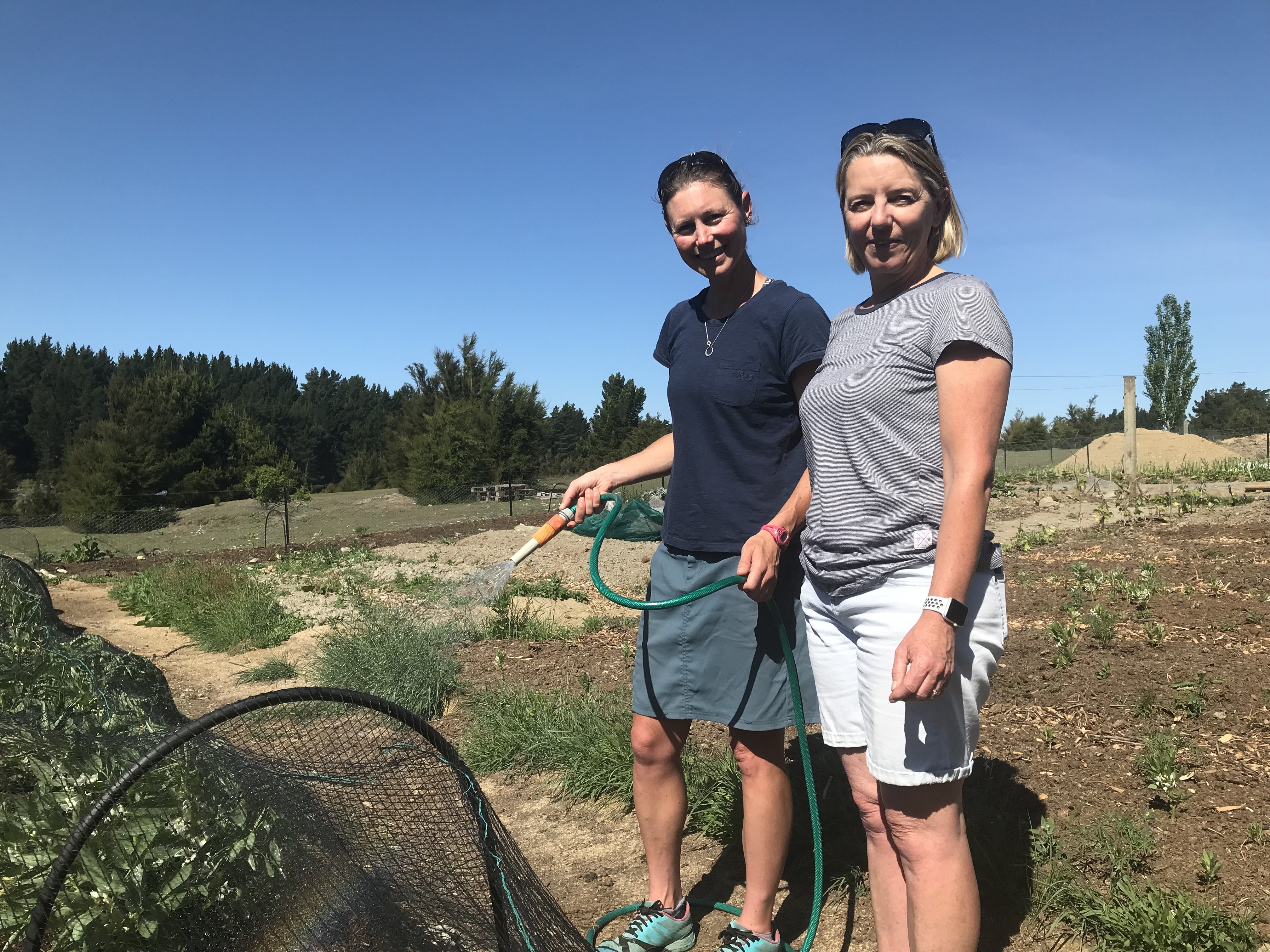 Grow Wanaka members Emberley Wetherall (left) and Julia Greeks love being in their community...