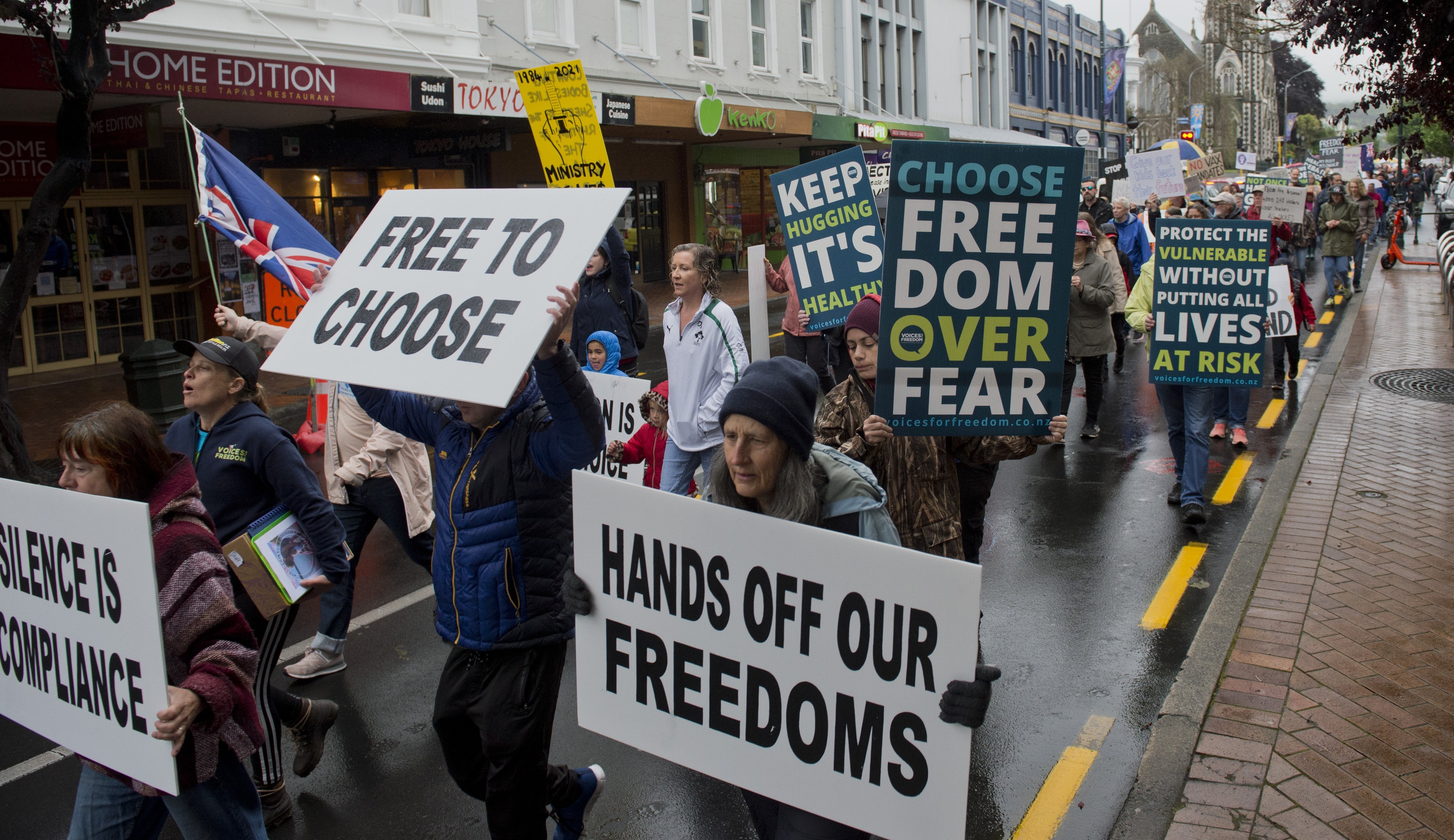 More than 260 people marched in George St on Saturday, to show their opposition to Covid-19...