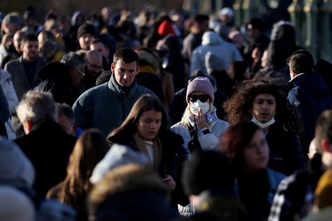 People walk across Westminster Bridge in London. Photo: Reuters 