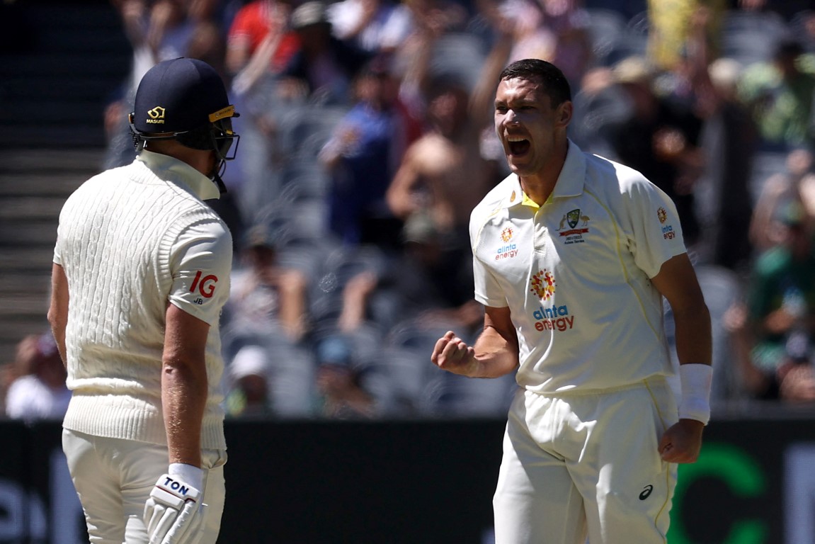 Australia's Scott Boland celebrates taking the wicket of England's Jonny Bairstow. Photo: Reuters