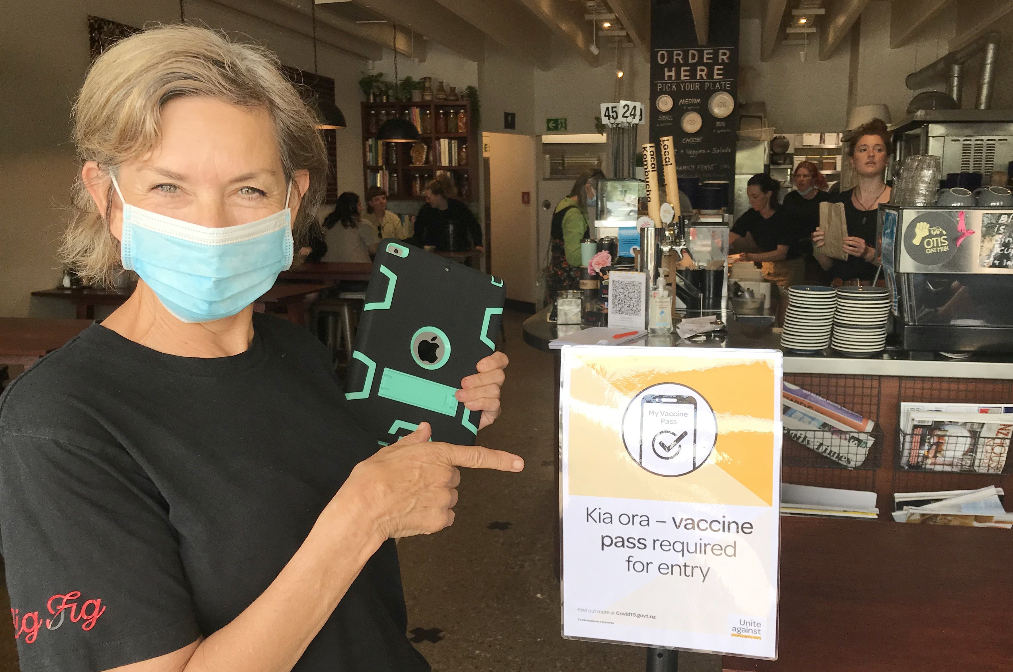 Big Fig co-owner Chrissie La Hood was doing vaccine passport checks on customers yesterday. PHOTO...