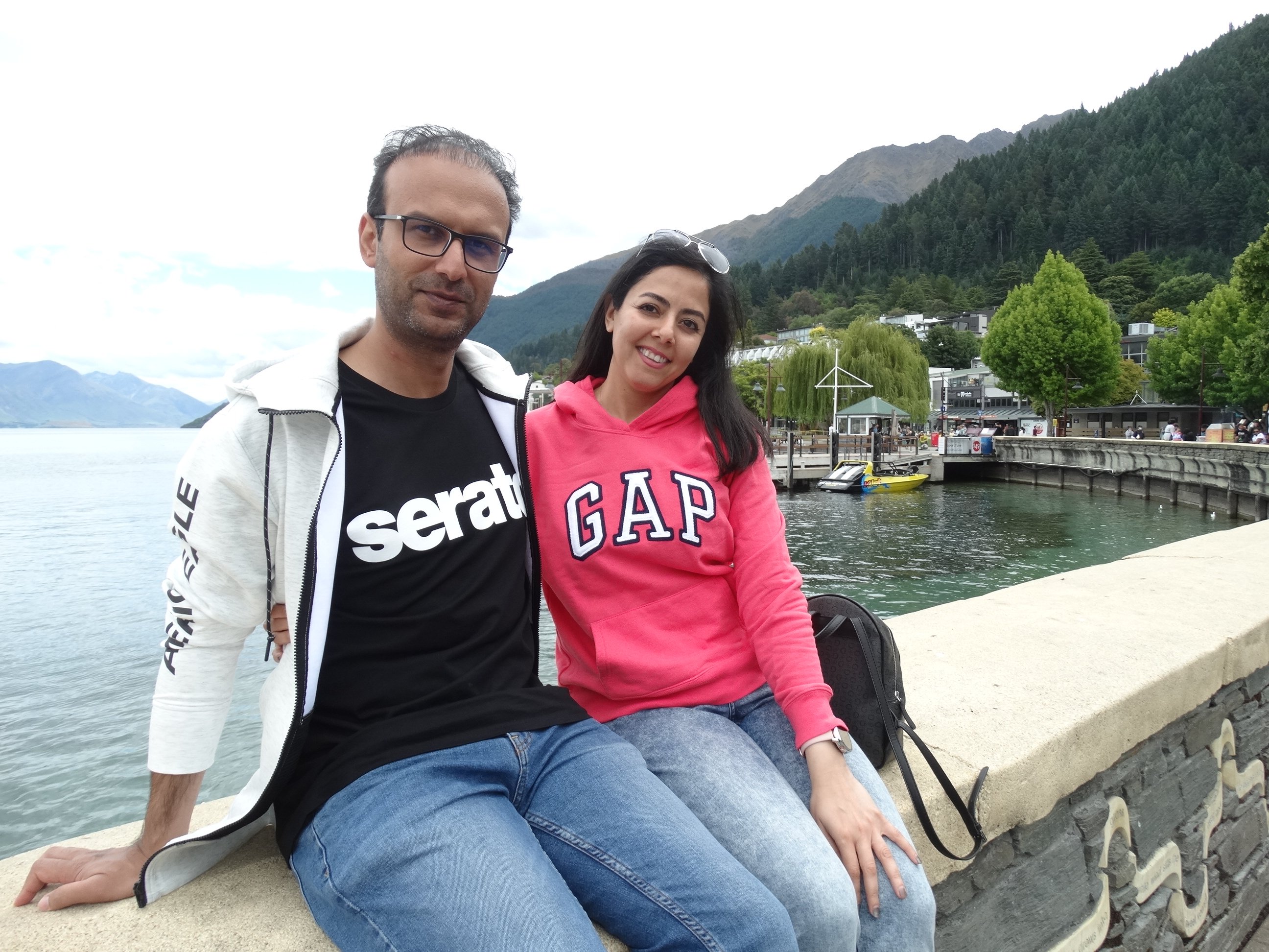 Aucklanders Amir Beli (left) and Jaberi Ebrahimi relax on Queenstown’s waterfront yesterday....