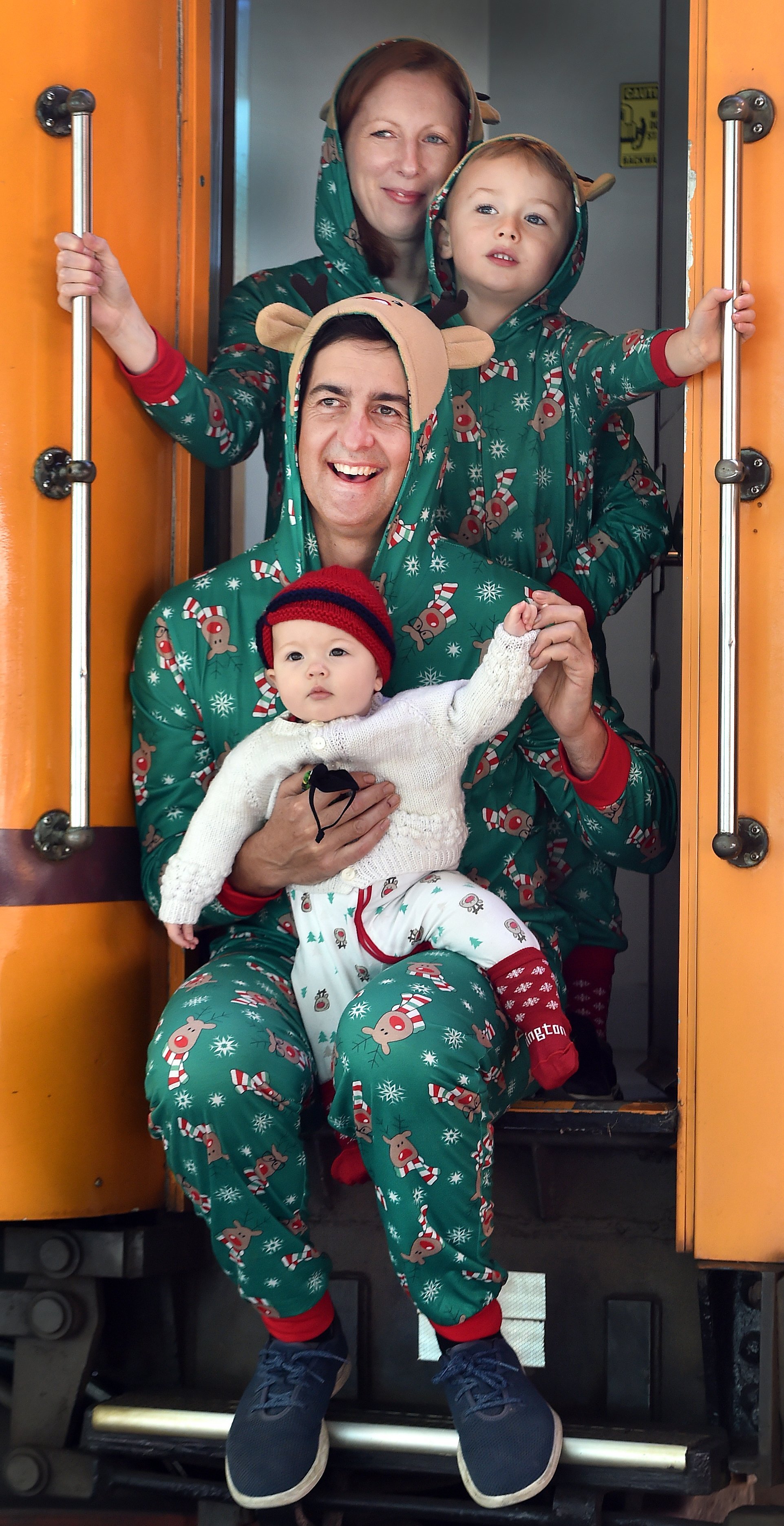 Boarding Dunedin Railways’ Christmas Inlander service in matching onesie pyjamas on Saturday...
