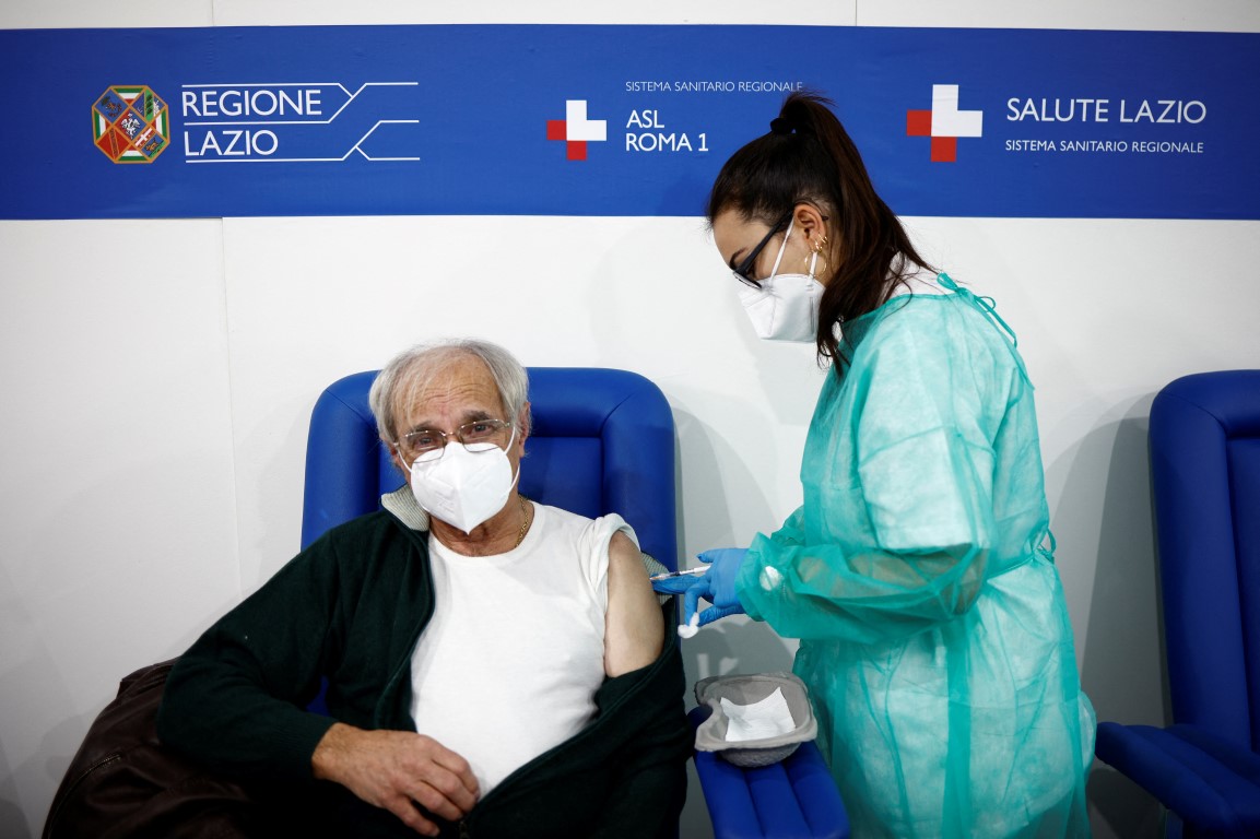 A man receives a dose of the Moderna vaccine in Rome. Photo: Reuters