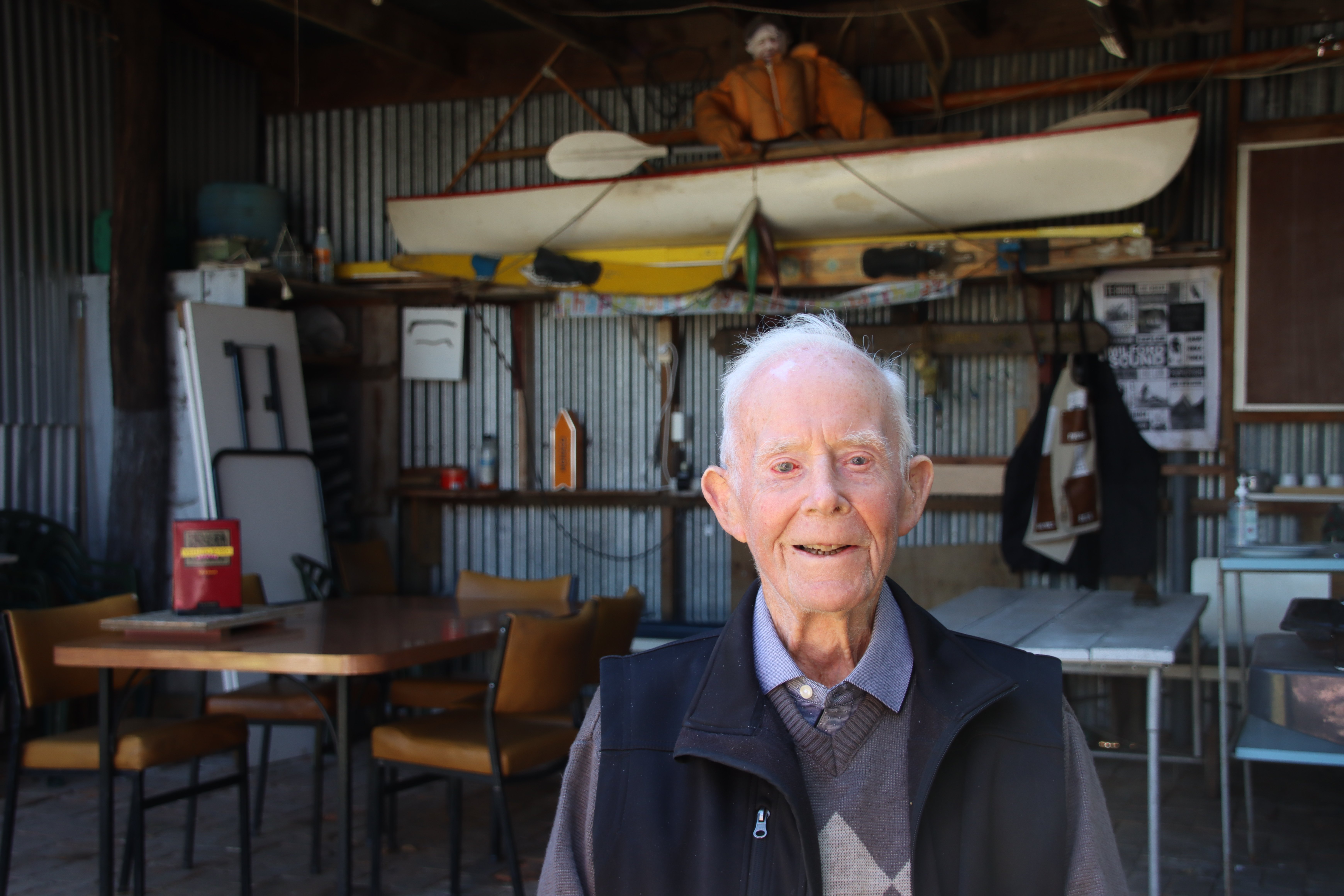 Gore man Fred Cooper, who marked his 100th birthday in Te Anau yesterday, sits at the entranceway...