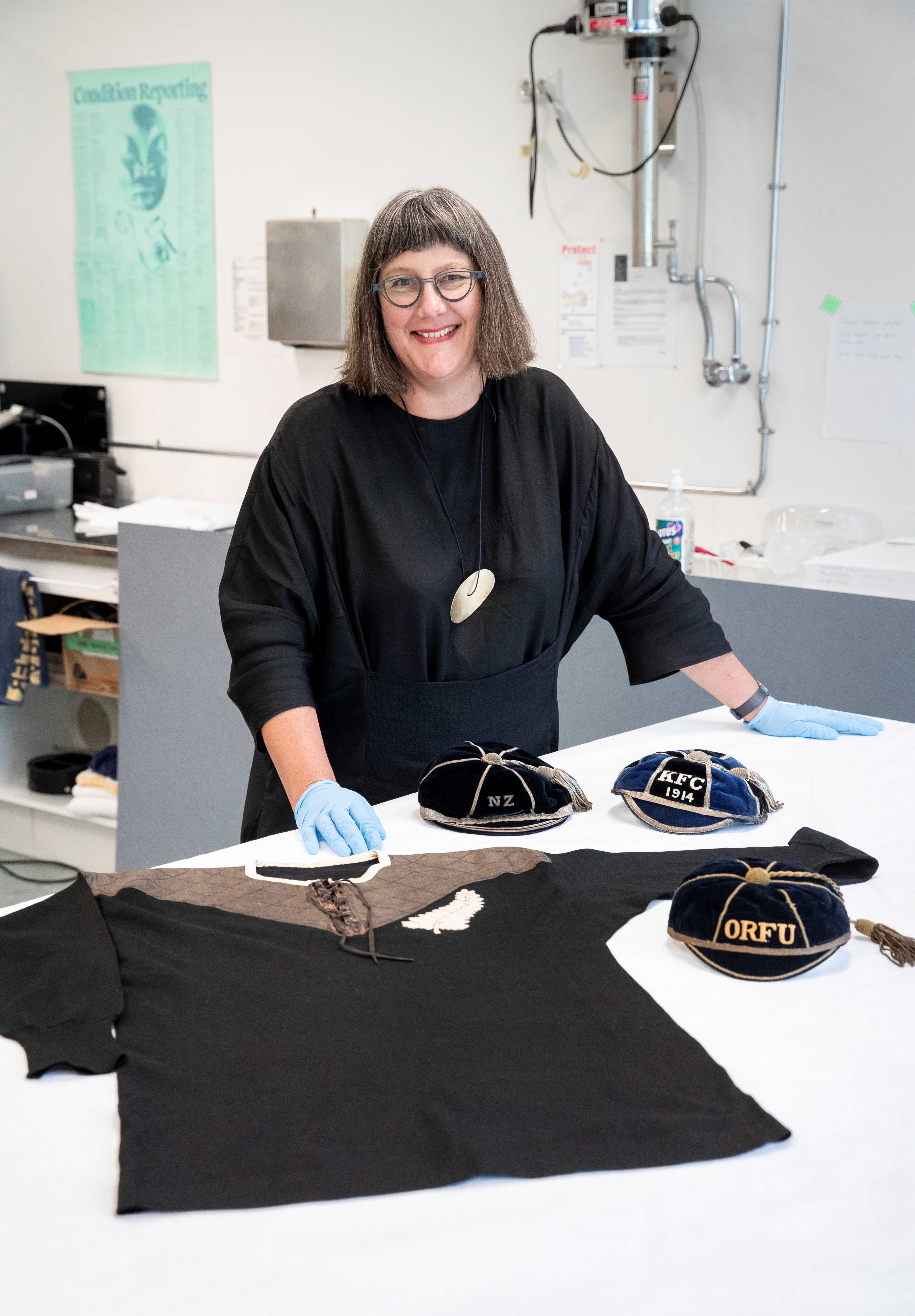 Claire Regnault, of Te Papa, with Originals jersey. PHOTO: MAARTEN HOLL, TE PAPA.
