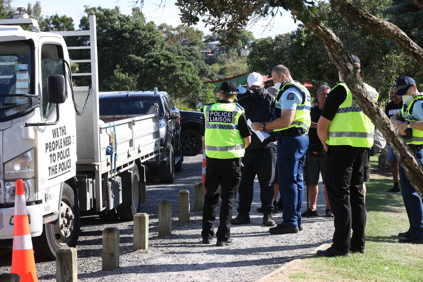 Police talk with protesters at Onepoto Domain this morning. Photo: NZ Herald